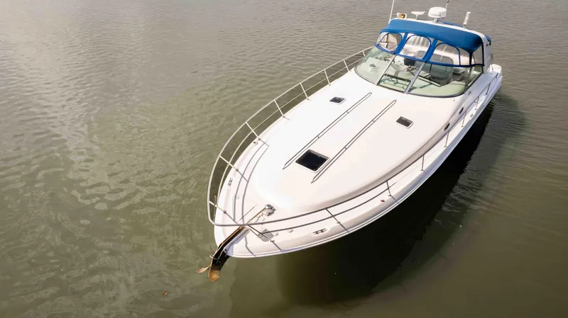 Slide: The Image of 1998 Sea Ray Sundancer 400 yacht on calm water, aerial view. - 14