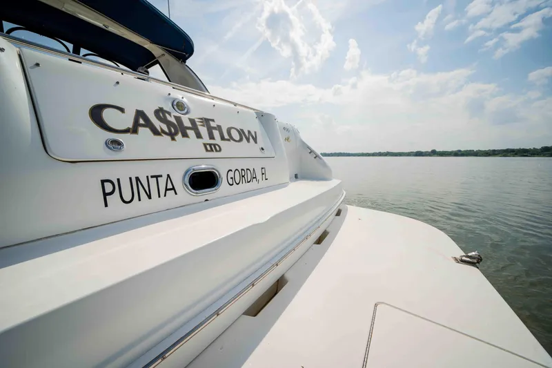 Slide: The Image of 1998 Sea Ray Sundancer 400 yacht named "Cash Flow" docked in Punta Gorda, Florida. - 21