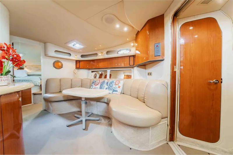 Slide: The Image of Luxurious interior of 1998 Sea Ray Sundancer 400 yacht with plush seating and elegant decor. - 37