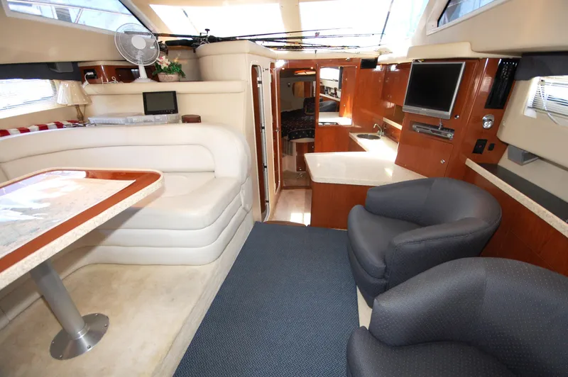 Slide: The Image of Luxurious interior of 2005 Regal Commodore 3880 yacht with modern amenities and seating. - 22