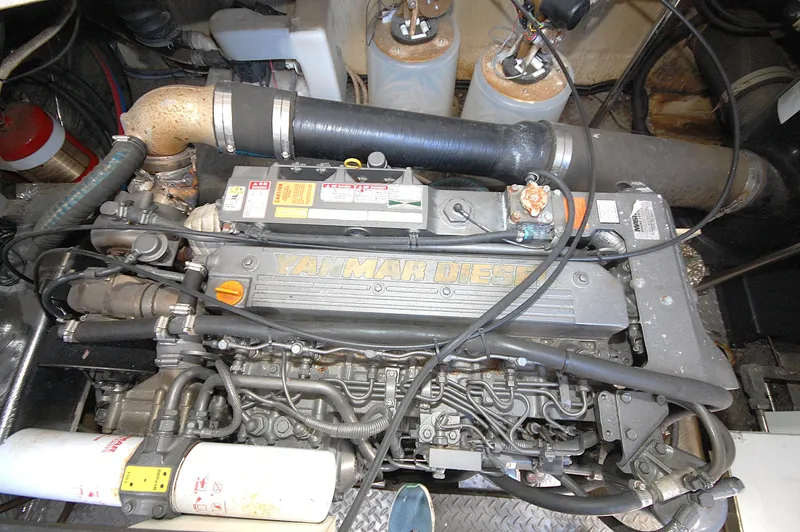 Slide: The Image of Engine of 2005 Regal Commodore 3880 boat, showcasing detailed components and layout. - 34