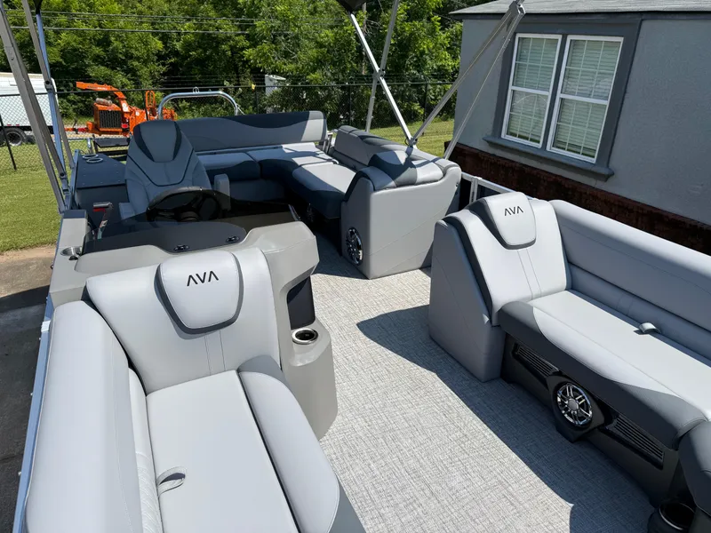 Slide: The Image of 2025 Avalon LSZ Cruise Bench pontoon boat with luxurious gray seating and modern design. - 10
