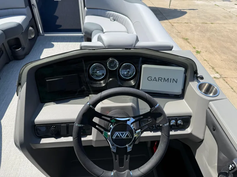 Slide: The Image of 2025 Avalon LSZ Cruise Bench dashboard with Garmin display and steering wheel. - 16