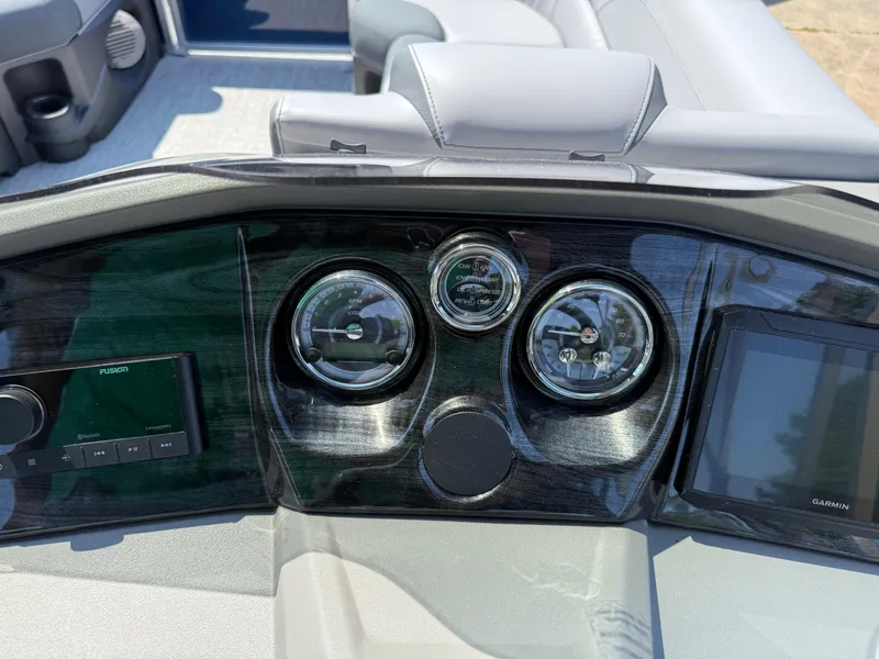 Slide: The Image of Dashboard of 2025 Avalon LSZ Cruise Bench with gauges and Garmin display. - 18