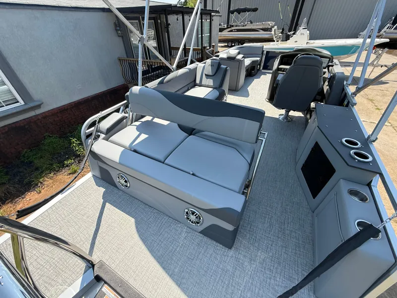 Slide: The Image of 2025 Avalon LSZ Cruise Bench boat interior with gray seating and modern amenities. - 31