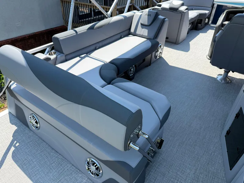 Slide: The Image of 2025 Avalon LSZ Cruise Bench with gray seating and modern design on a boat deck. - 33