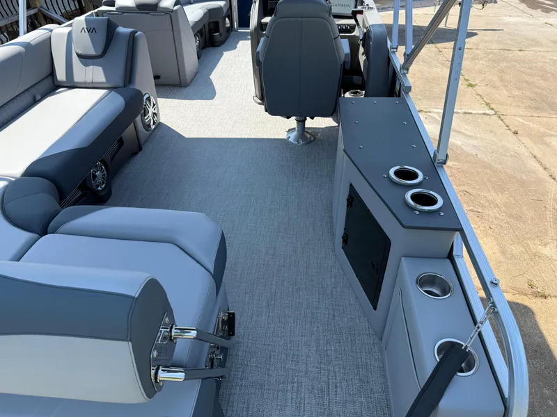 Slide: The Image of 2025 Avalon LSZ Cruise Bench interior with gray seating and cup holders on a pontoon boat. - 36
