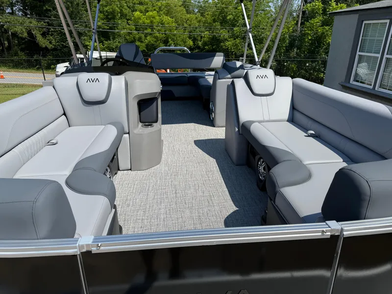 Slide: The Image of 2025 Avalon LSZ Cruise Bench pontoon boat with spacious seating and modern design. - 7