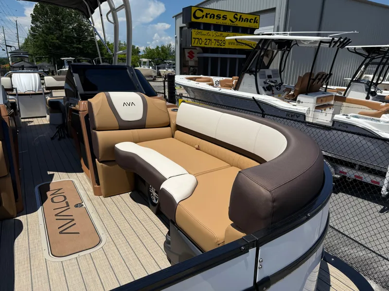 Slide: The Image of 2025 Avalon Catalina Quad Lounger Windshield boat with luxurious seating and modern design. - 10