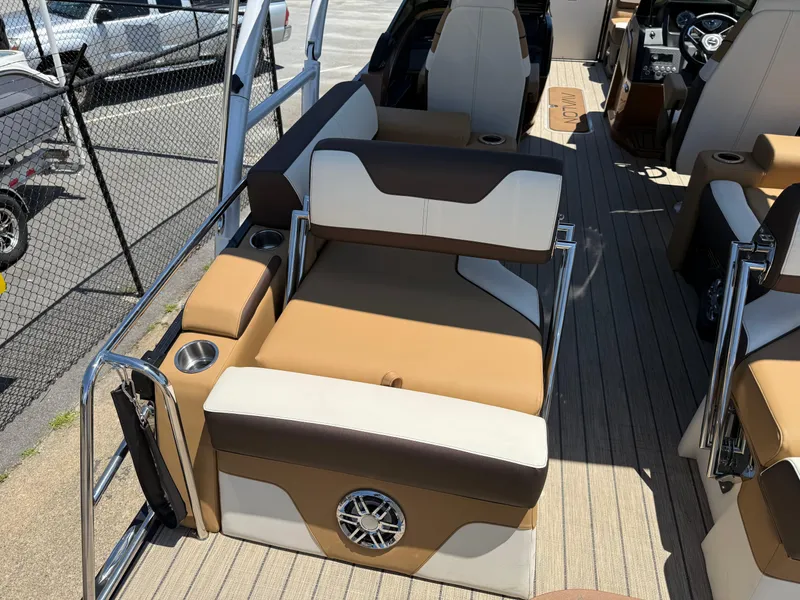 Slide: The Image of 2025 Avalon Catalina Quad Lounger Windshield interior with luxurious seating and cup holders. - 37