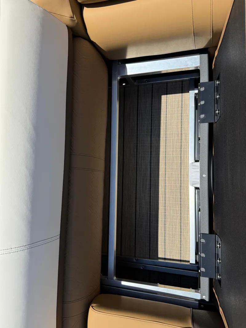 Slide: The Image of Interior view of 2025 Avalon Catalina Quad Lounger Windshield, showcasing seat structure and upholstery. - 43