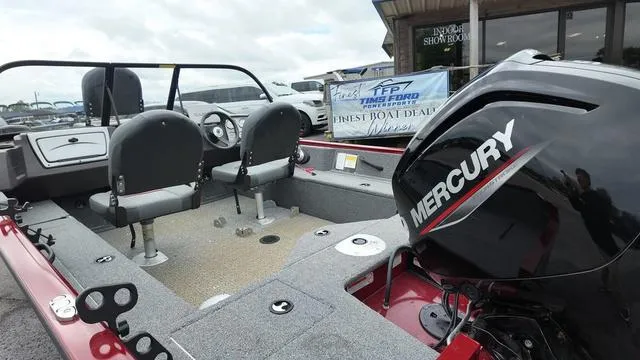 Slide: The Image of 2023 Tracker Pro Guide™ V-16 SC boat with Mercury engine, interior view. - 12