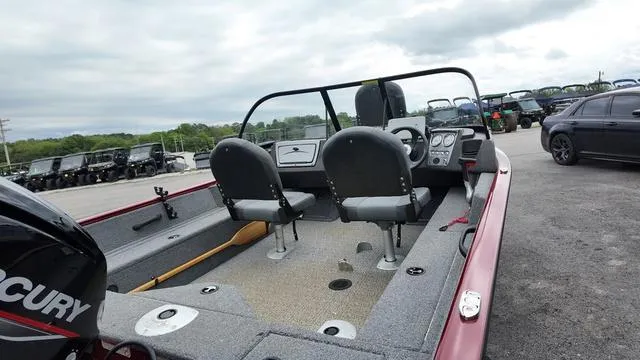 Slide: The Image of 2023 Tracker Pro Guide™ V-16 SC boat interior with dual seats and Mercury engine. - 13