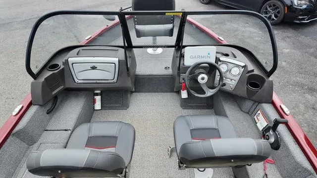 Slide: The Image of 2023 Tracker Pro Guide™ V-16 SC boat interior with Garmin navigation system and dual seating. - 15