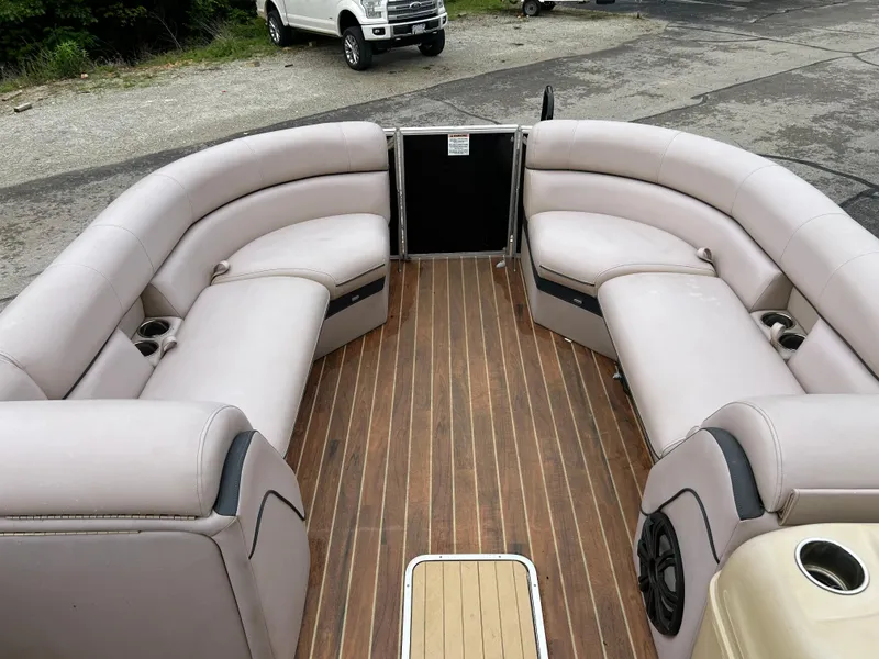 Slide: The Image of 2017 South Bay 525 RS Arch 3.0+ pontoon boat with spacious seating and wood-style flooring. - 9