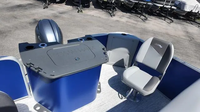 Slide: The Image of 2025 Bennington 20 SF Fish boat interior with seating and control panel. - 19