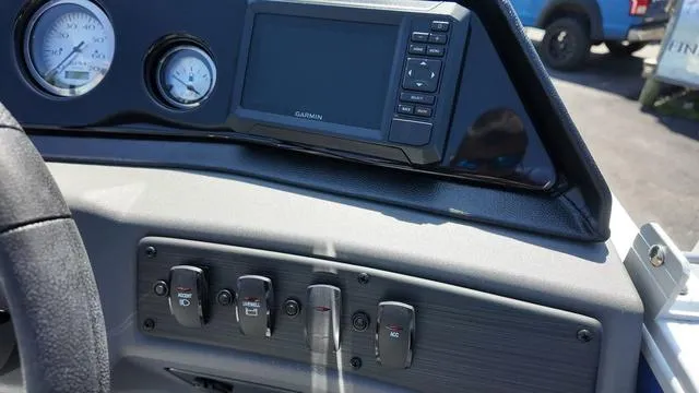 Slide: The Image of Dashboard of 2025 Bennington 20 SF Fish boat with Garmin display and control switches. - 26