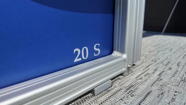 Slide: The Image of Close-up of Bennington 20 SF Fish 2025 model, featuring blue panel and silver frame. - 8