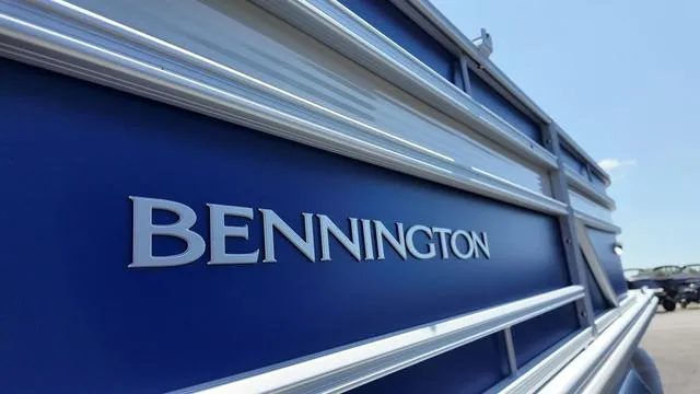 Slide: The Image of 2025 Bennington 20 SF Fish boat, blue exterior with logo, sunny day. - 9