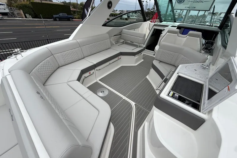 Slide: The Image of Luxurious interior of 2026 Sea Ray Sundancer 320 yacht with elegant seating and modern design. - 5