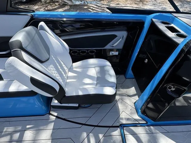 Slide: The Image of 2022 Yamaha Boats 255XD interior with sleek seating and modern design. - 16