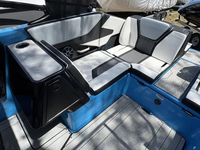 Slide: The Image of 2022 Yamaha Boats 255XD interior with sleek seating and modern design. - 19