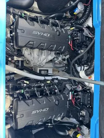 Slide: The Image of 2022 Yamaha Boats 255XD engine compartment with dual SVHO engines. - 27