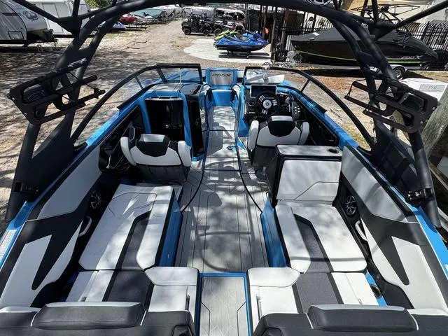 Slide: The Image of 2022 Yamaha Boats 255XD interior with modern seating and sleek design. - 3