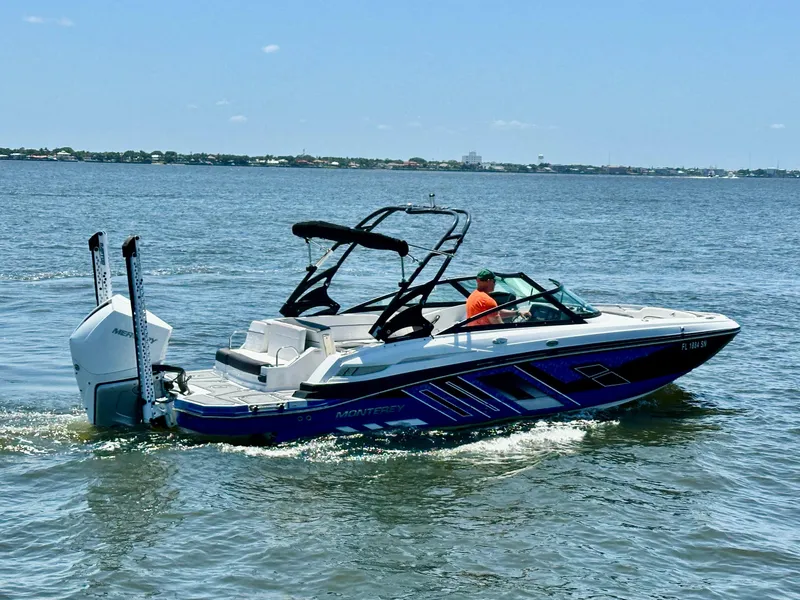 Slide: The Image of 2019 Monterey M45 boat cruising on a sunny day in open water. - 1
