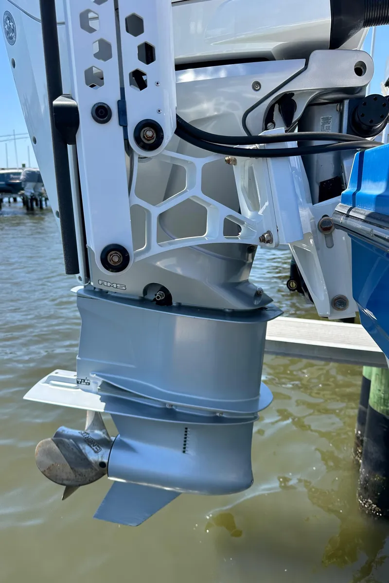 Slide: The Image of 2019 Monterey M45 outboard motor in water, showcasing propeller and mounting details. - 10