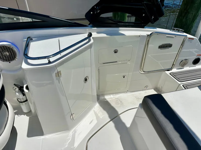 Slide: The Image of 2019 Monterey M45 boat interior with storage compartments and seating area. - 15