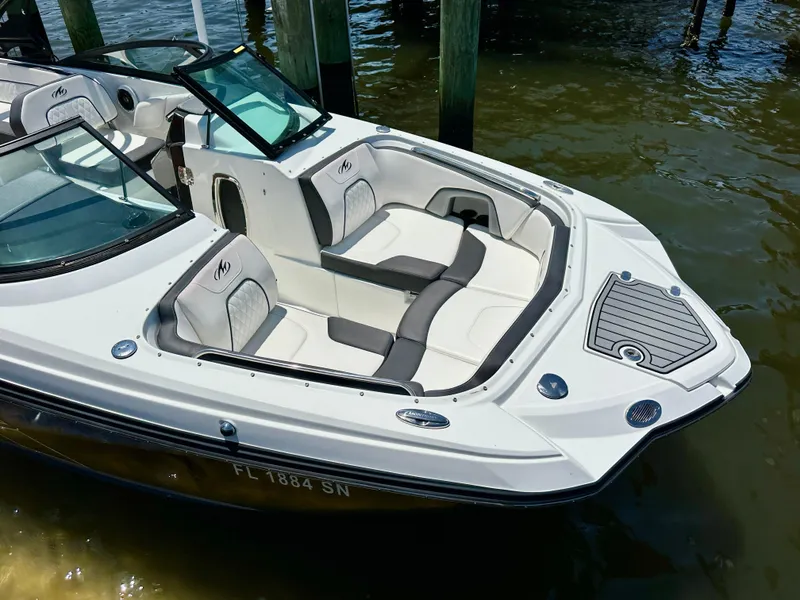 Slide: The Image of 2019 Monterey M45 boat with sleek design, docked in calm waters. - 3