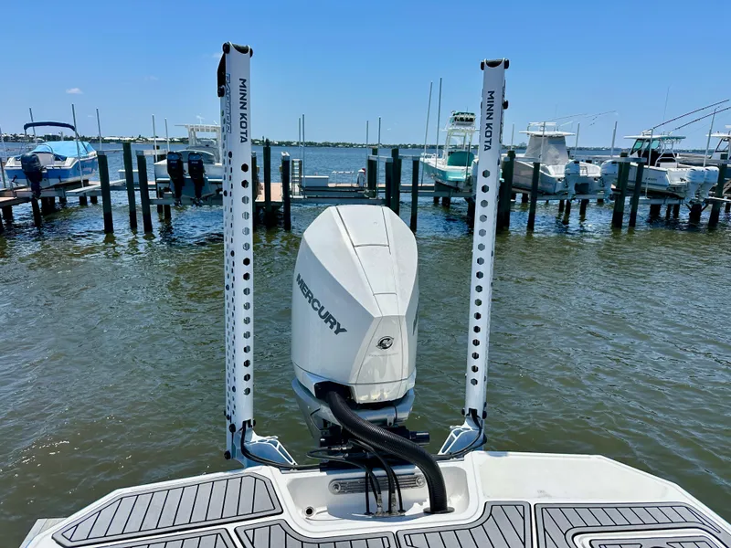 Slide: The Image of 2019 Monterey M45 boat with Mercury engine docked at marina, clear blue sky. - 8