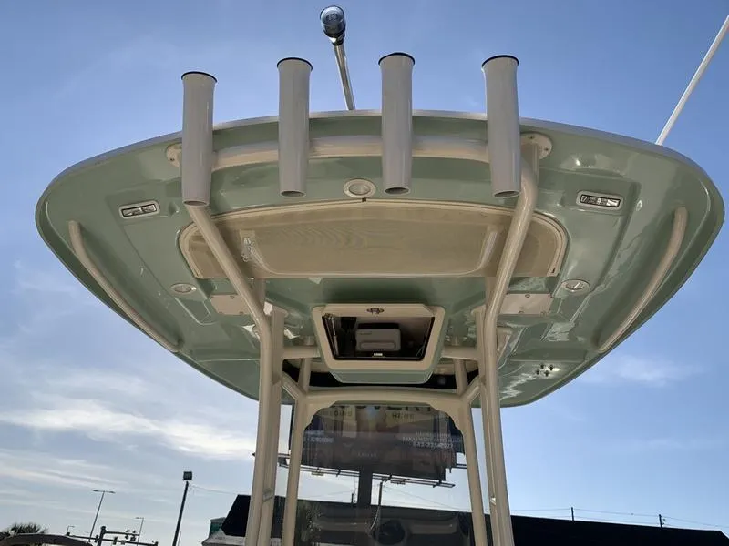 Slide: The Image of 2023 Grady-White 251 Coastal Explorer boat, featuring a sleek overhead view with rod holders. - 12