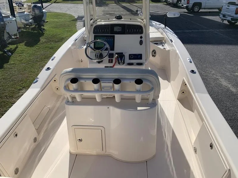 Slide: The Image of 2023 Grady-White 251 Coastal Explorer boat interior with helm and seating. - 15