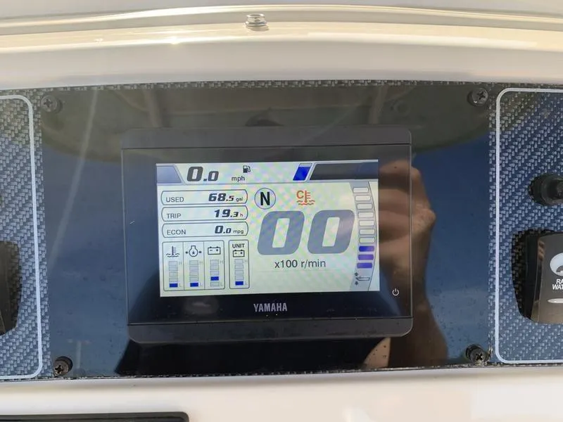 Slide: The Image of Dashboard display of 2023 Grady-White 251 Coastal Explorer boat, showing speed and fuel data. - 22