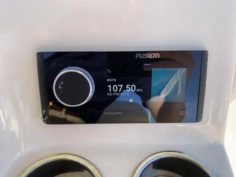 Slide: The Image of Fusion marine radio display on 2023 Grady-White 251 Coastal Explorer boat. - 23