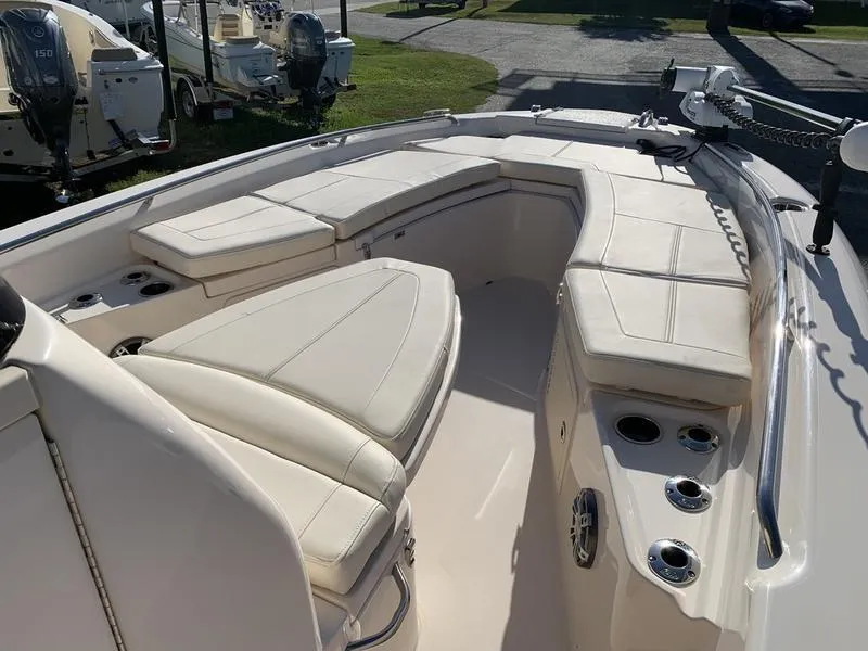 Slide: The Image of 2023 Grady-White 251 Coastal Explorer boat with spacious seating and cup holders. - 28