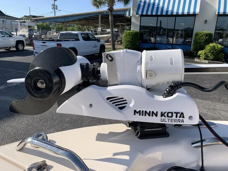 Slide: The Image of Minn Kota Ulterra motor on 2023 Grady-White 251 Coastal Explorer boat, outdoor setting. - 35
