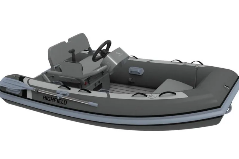 Slide: The Image of 2025 Highfield Classic 310 inflatable boat, gray with steering console and seating. - 7