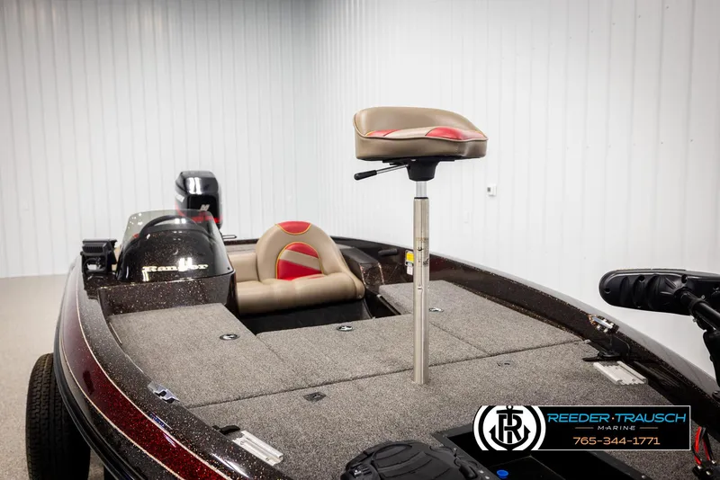 Slide: The Image of 2001 Ranger R81 boat interior with seating and storage compartments. - 19