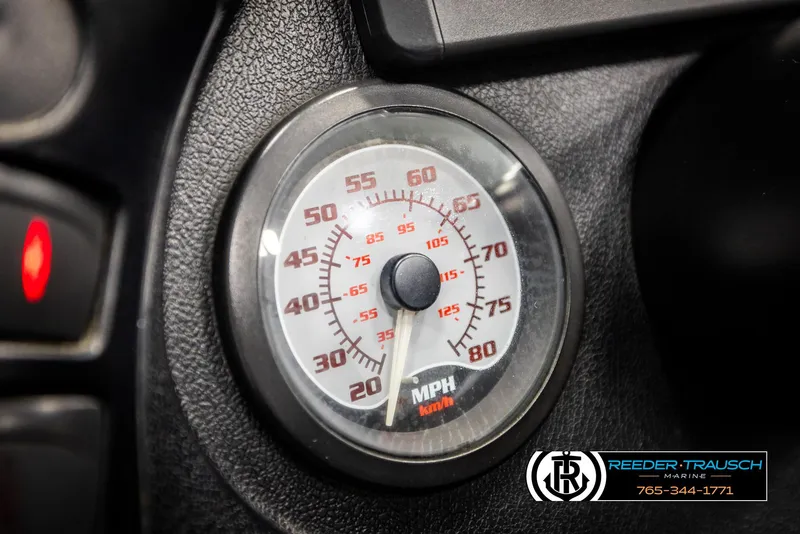 Slide: The Image of Speedometer of 2001 Ranger R81 boat, showing MPH and KMH, with Reeder-Trausch Marine logo. - 30