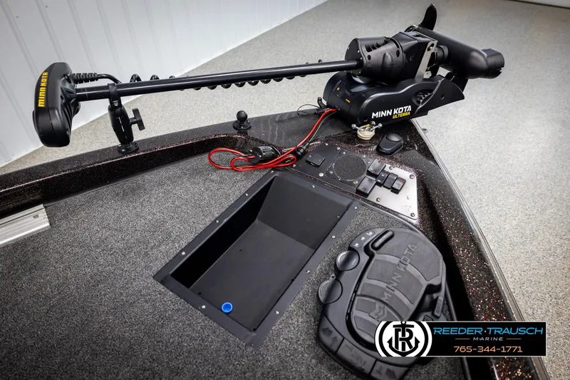 Slide: The Image of 2001 Ranger R81 boat deck with Minn Kota trolling motor and control panel. - 41