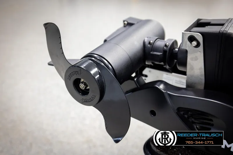 Slide: The Image of Close-up of a 2001 Ranger R81 boat motor propeller, featuring a sleek black design. - 45