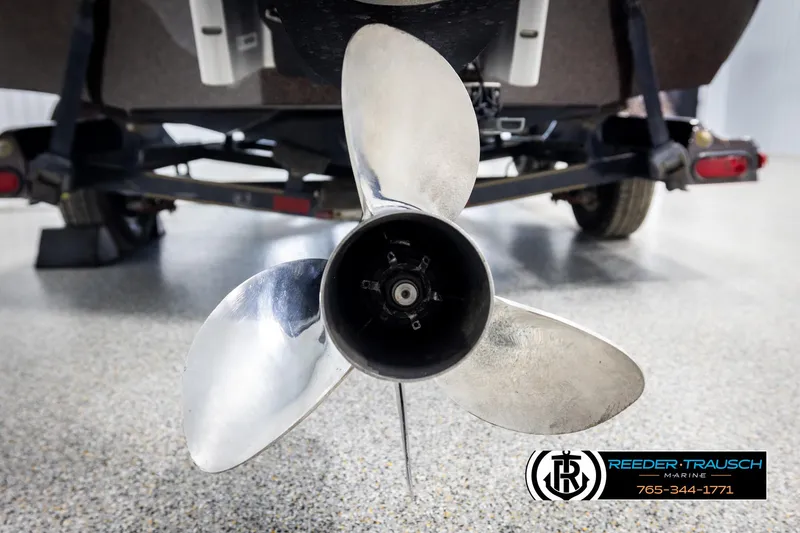 Slide: The Image of 2001 Ranger R81 boat propeller on trailer, close-up view. - 49