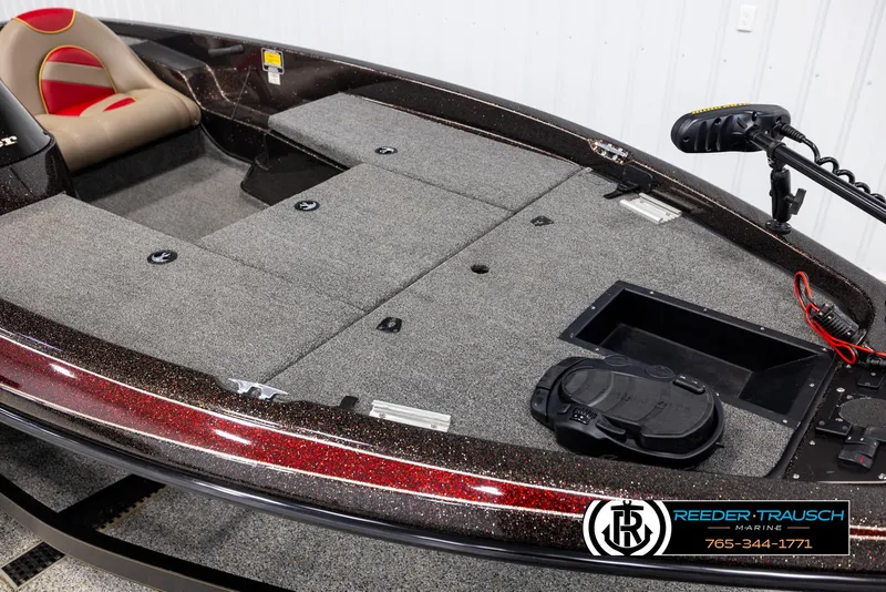 Slide: The Image of 2001 Ranger R81 boat interior with carpeted deck and seating. - 7