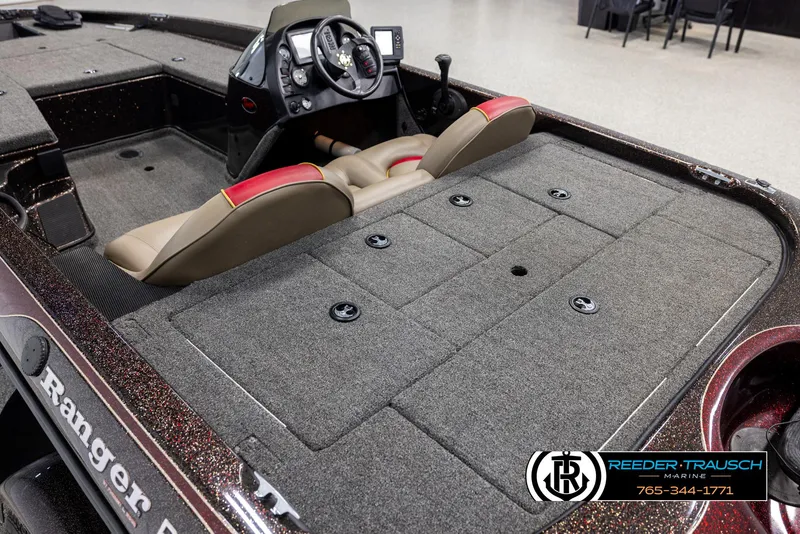 Slide: The Image of Ranger R81 boat interior, 2001 model, featuring steering console and seating. - 9