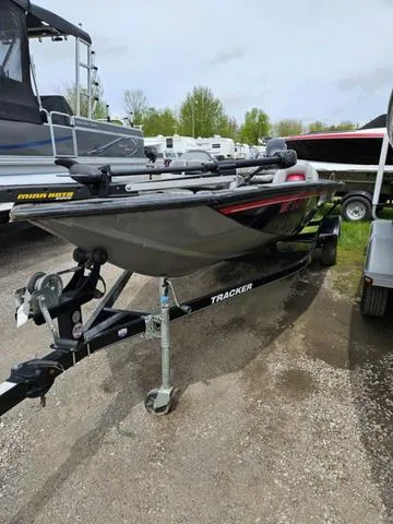 Slide: The Image of 2016 Tracker Pro Team™ 175 TXW boat interior with steering wheel and dashboard. - 4