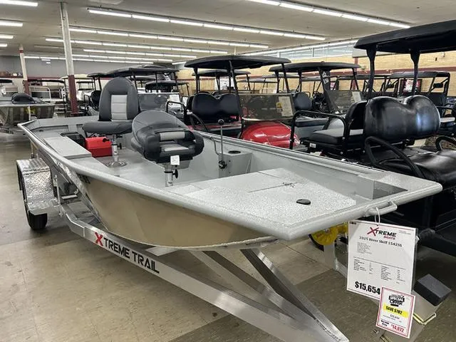 Slide: The Image of 2025 XTREME BOATS River Skiff 1542SS displayed in showroom, priced at $15,654. - 1