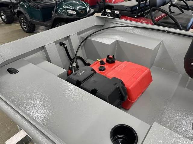 Slide: The Image of 2025 XTREME BOATS River Skiff 1542SS interior with fuel tank and battery setup. - 6